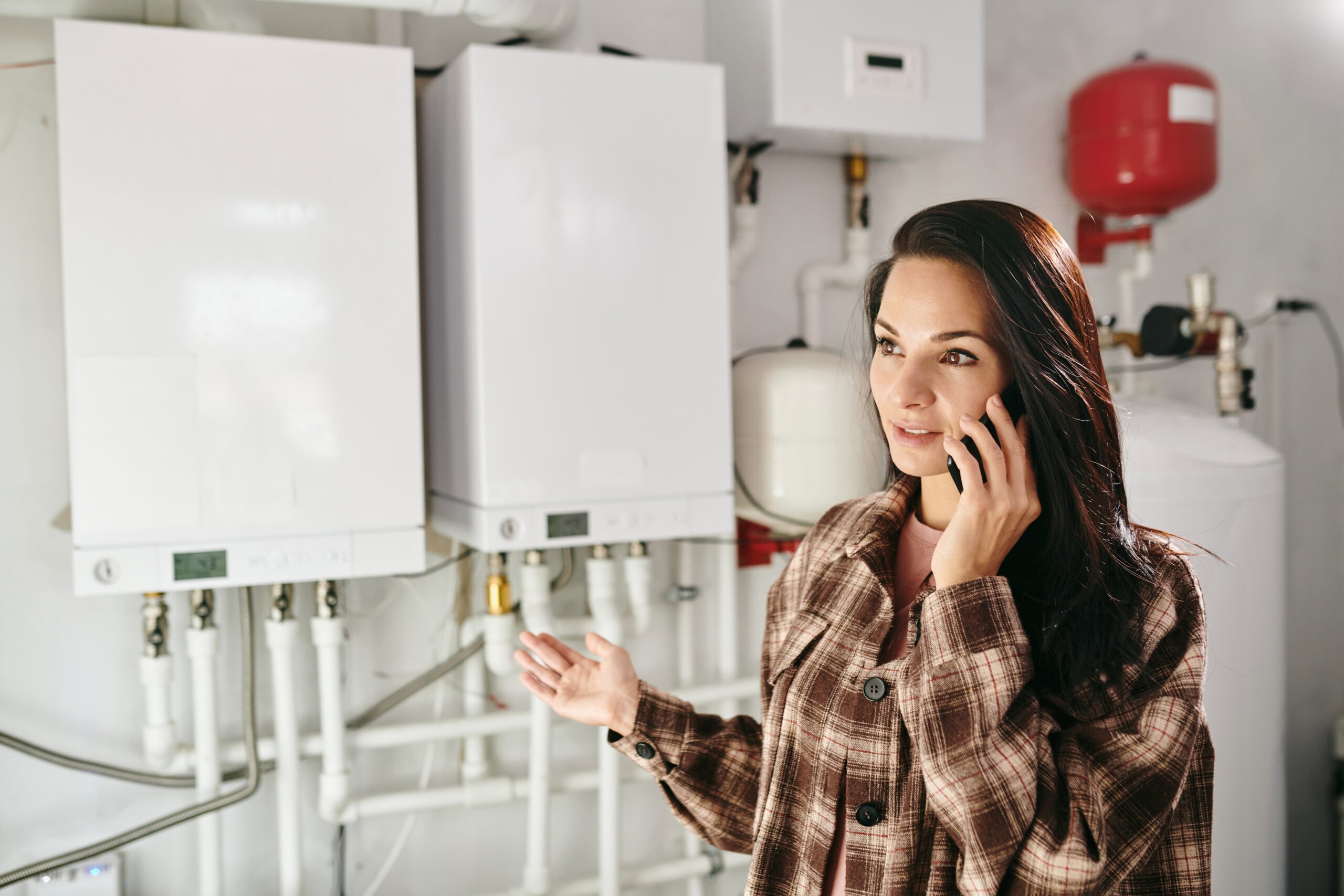 woman enquiring about hot water system installation costs