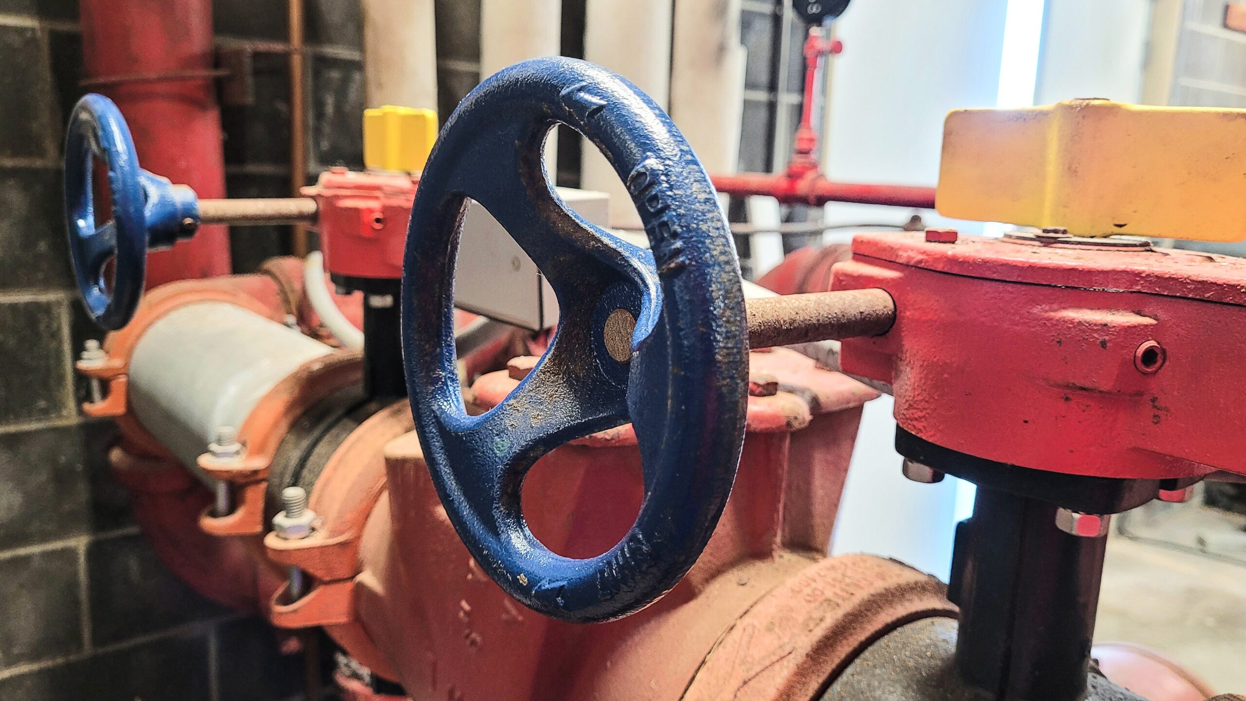 backflow valve wheel in a utility room